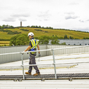 Rooftop walkway with guardrail protection